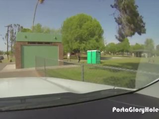 Porta Gloryhole desirable woman sucking johnson in the park