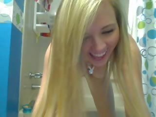 Busty blonde teen movs herself off taking a shower video