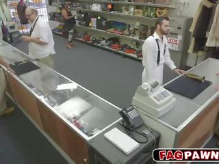 Dude blows a johnson behind counter in a shop